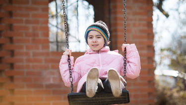 Child on a swing